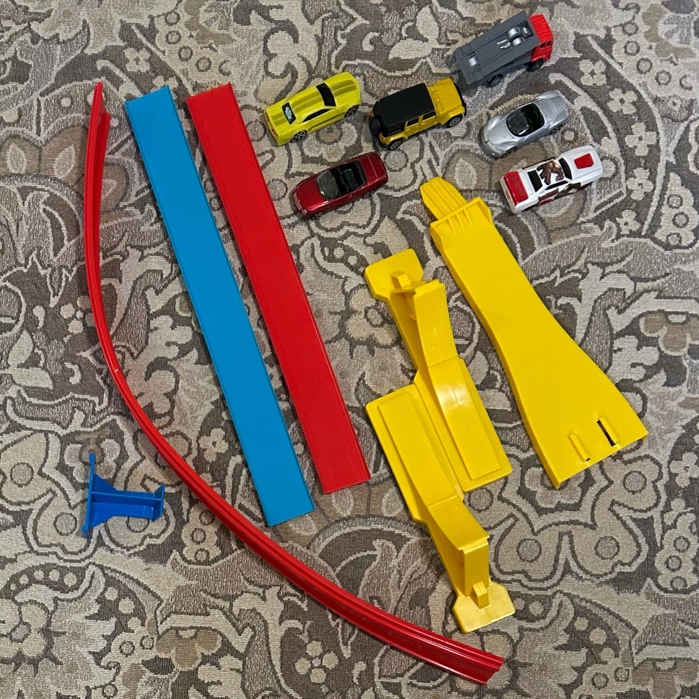 6 Maisto Cars and a Few Pieces of Track. Includes Marvel Juggernaut Slayer Car